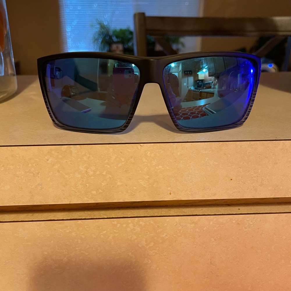 Costas black rim, blue lenses mens sunglasses. Barely worn